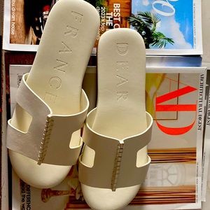 Dear Frances. New. Tried on.